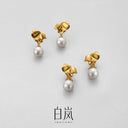 Pearl Ear Studs with Gourd Leaf Design - 